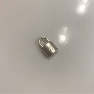 Louis Vuitton silver lock charm